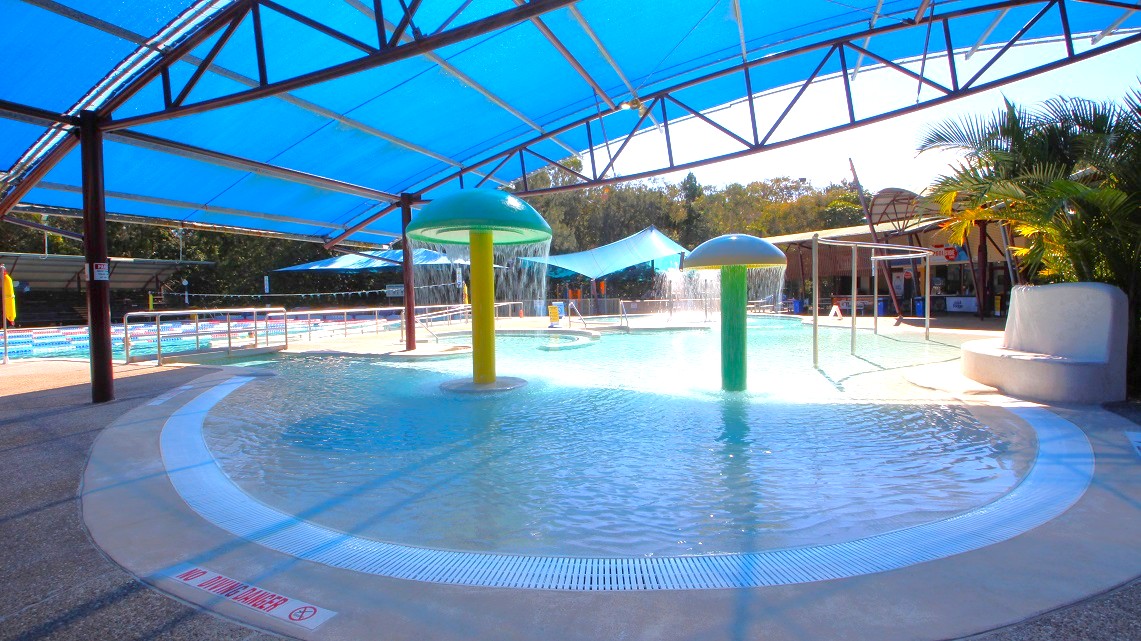 Open-air 25-meter pool with eight lanes featuring ramp access for convenience. Additionally, there's a kids' leisure pool with fun water fountains, perfect for little ones to enjoy. Among the bushland, there's also a relaxing whirlpool. Inside the pool area, you'll notice mushroom-like statues in the water for children to play under. Open-air 25-meter pool with eight lanes featuring ramp access for convenience. Additionally, there's a kids' leisure pool with fun water fountains, perfect for little ones to enjoy. Among the bushland, there's also a relaxing whirlpool. Inside the pool area, you'll notice mushroom-like statues in the water for children to play under.