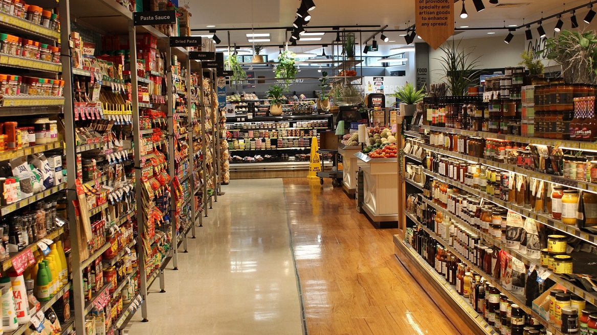 This is a closer view of the divided sections of the fruit and vegetable section and the pasta aisle. Half of the aisle floor is brown that designates the fruit and vegetable section while white on the other side indicates a different section of the store which is the pasta aisle. At the right side, which is the pasta aisle, with different brands of pasta sauce, dried pasta and other ingredients used in cooking pasta. This is a closer view of the divided sections of the fruit and vegetable section and the pasta aisle. Half of the aisle floor is brown that designates the fruit and vegetable section while white on the other side indicates a different section of the store which is the pasta aisle. At the right side, which is the pasta aisle, with different brands of pasta sauce, dried pasta and other ingredients used in cooking pasta.